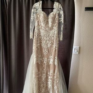 Brand New, Never Worn Ivory Wedding Dress. I paid $1500 but asking $1000.